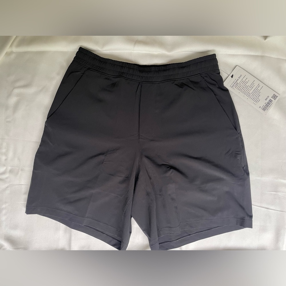 Solid black Lululemon Pace Breaker men’s 7” inseam gym athletic shorts